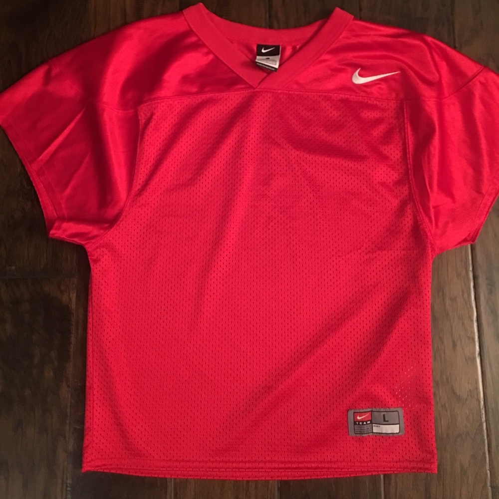 Like NEW Nike football practice jersey.